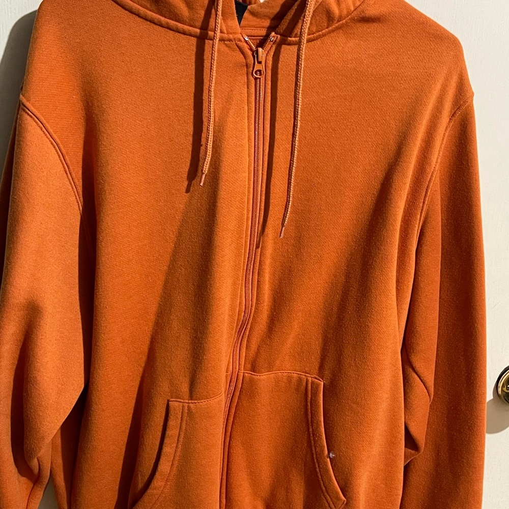 burnt orange zip up jacket with hood